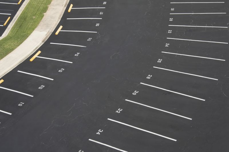Signs Your Commercial Parking Lot Needs Asphalt Sealing